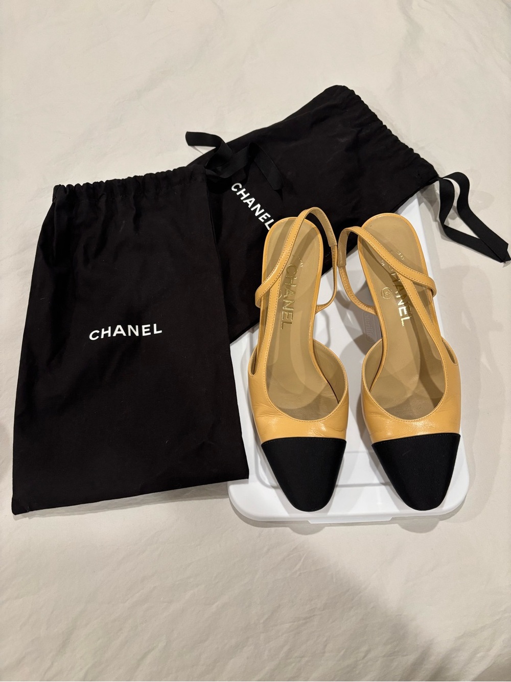 CHANEL Two-Tone Slingback Pumps in Tan and Black (worn twice)